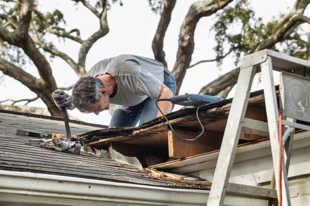 storm damage roof repair in Athol